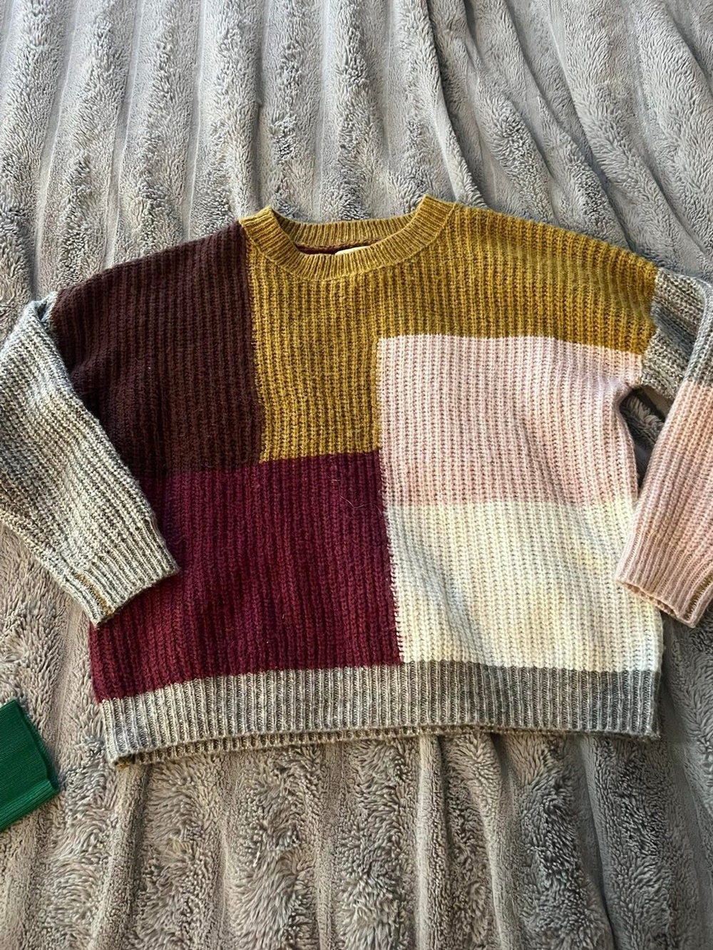 Roolee size small sweater. Fits medium as well.